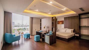 Premium Quadruple Room | Minibar, individually furnished, desk, blackout curtains