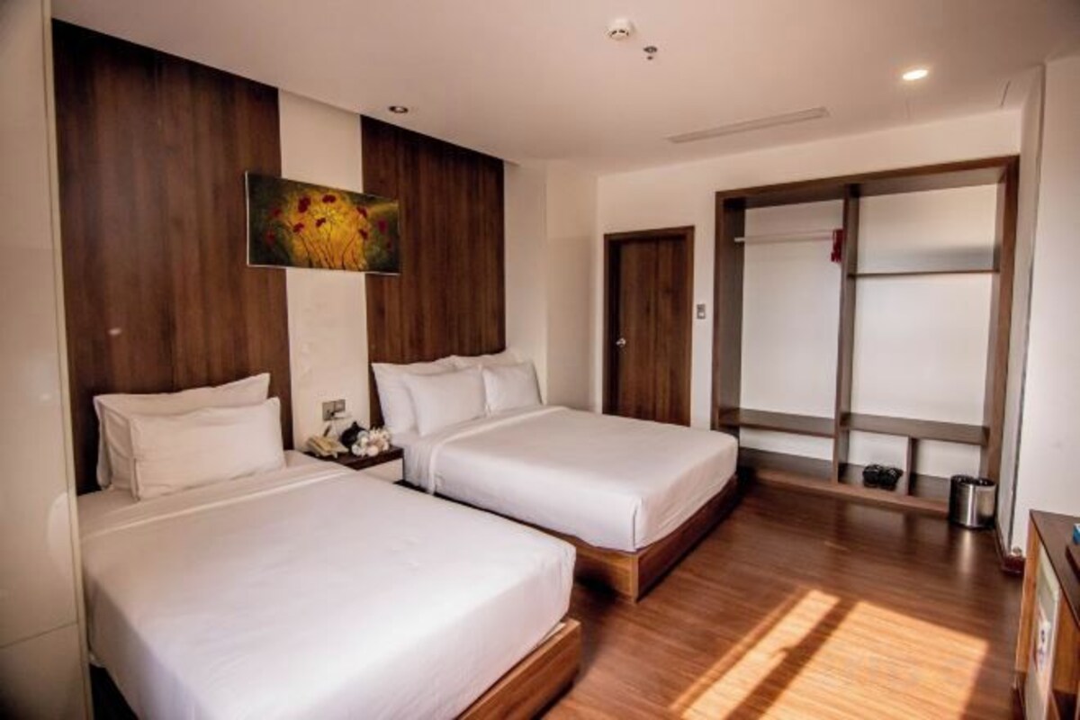 Cortinas blackout, wifi gratis y ropa de cama 