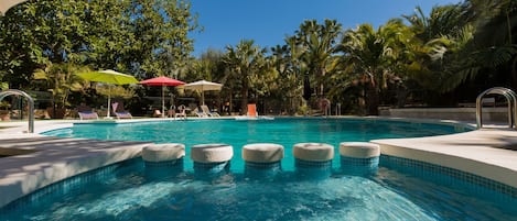 Outdoor pool, open 10 AM to 10 PM, pool umbrellas, sun loungers