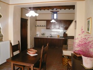 Apartment, 2 Bedrooms | Private kitchen | Full-size fridge, stovetop, dishwasher, cookware/dishes/utensils