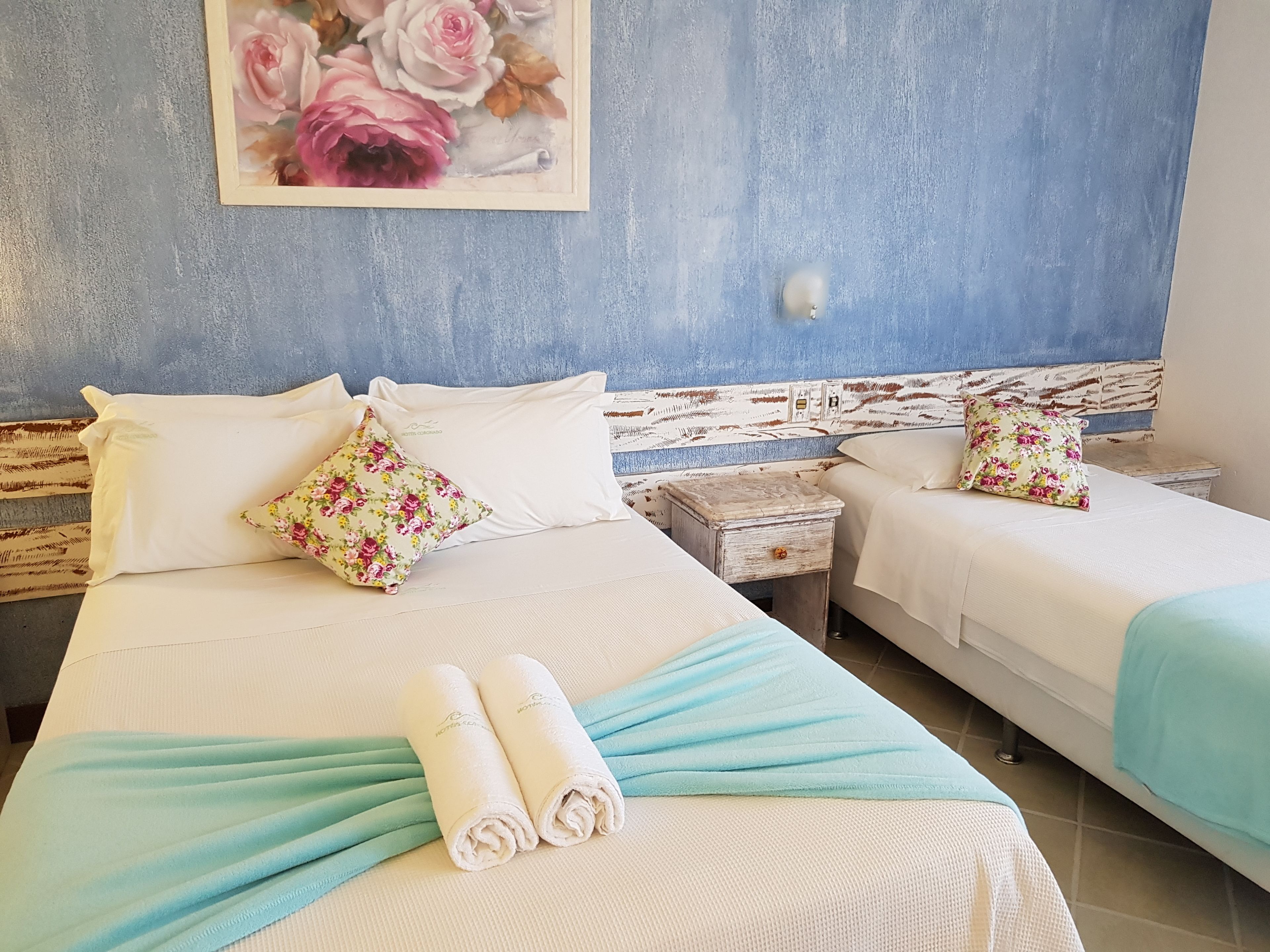 standard triple room, sea view | in-room safe, desk, free cots/infant beds, free wifi