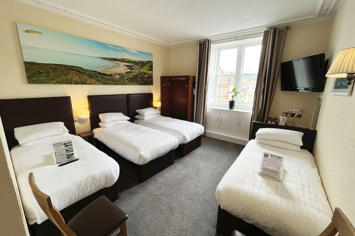 Standard Quadruple Room | Premium bedding, desk, blackout drapes, iron/ironing board (on request)