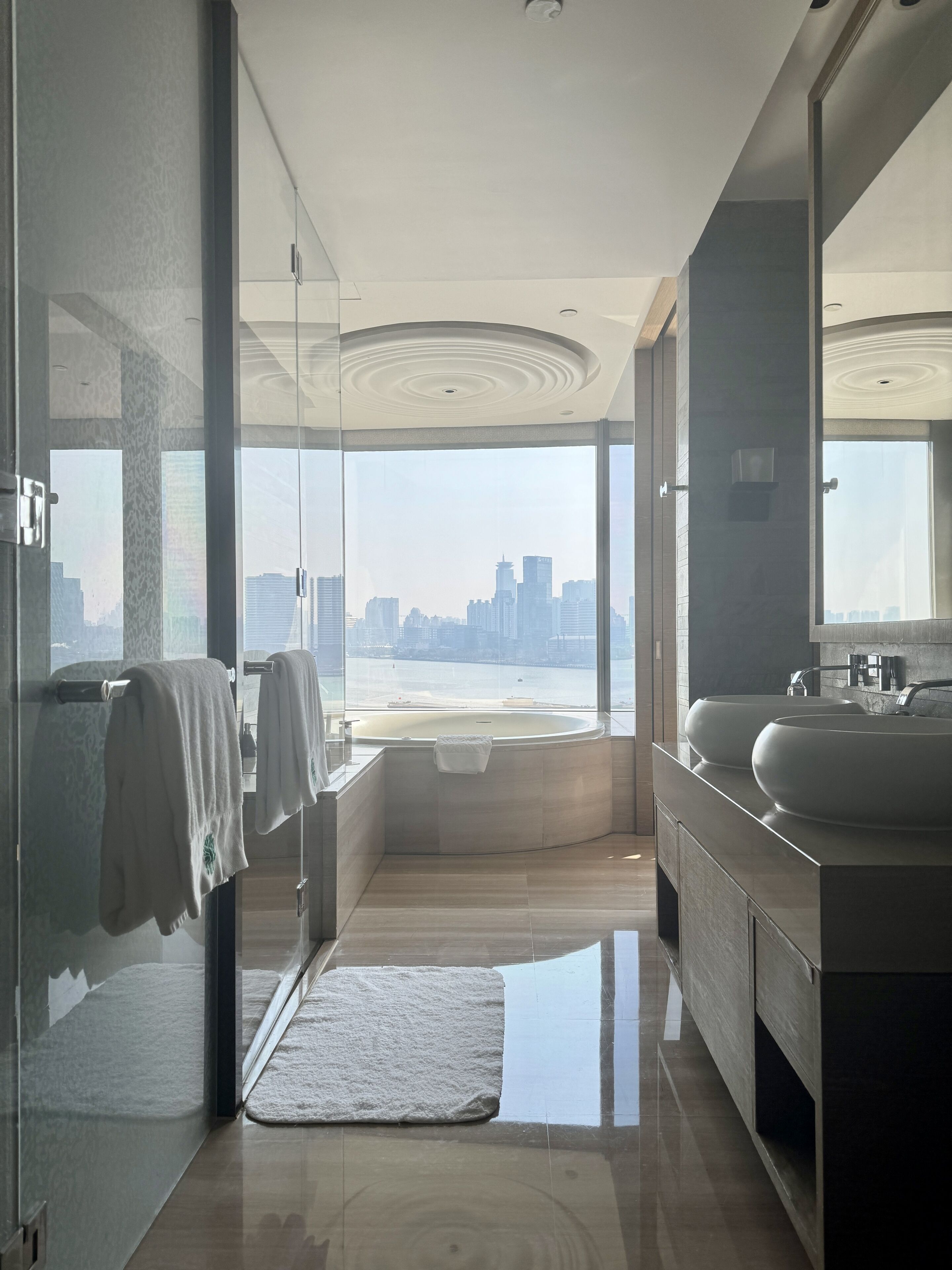 riverside retreat - king bed room | bathroom | separate bathtub and shower, rainfall showerhead, free toiletries