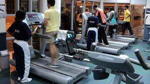 A gym with treadmills and exercise equipment. - Mayfair Hotel (Dar es Salaam)