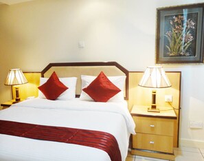 Standard Room | Down comforters, in-room safe, individually furnished, desk - Mayfair Hotel (Dar es Salaam)