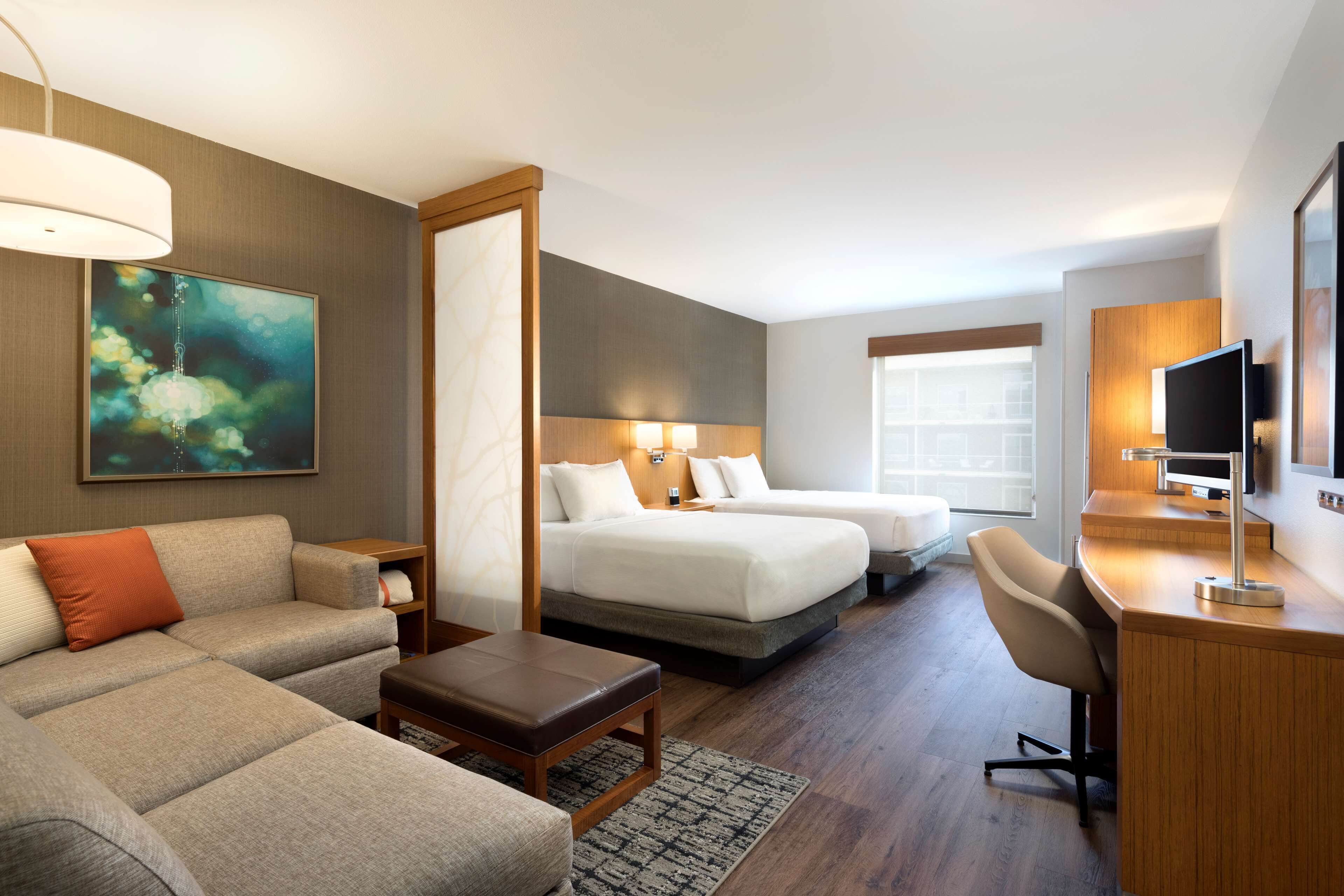 hypo-allergenic bedding, down duvets, in-room safe, desk