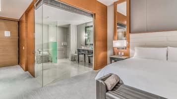 Premium bedding, down comforters, pillowtop beds, minibar