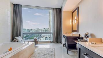 Separate bathtub and shower, designer toiletries, hair dryer, bathrobes