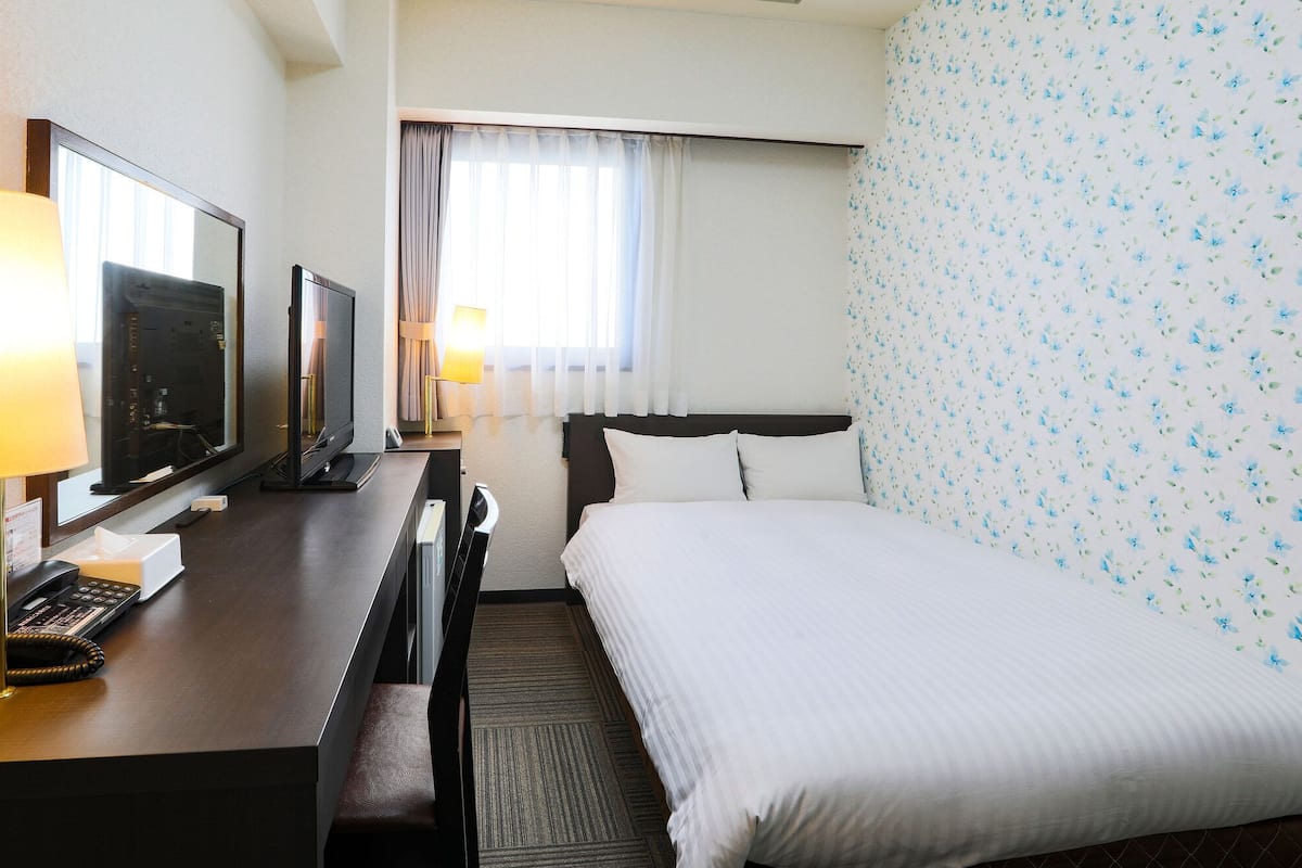 Desk, blackout curtains, iron/ironing board (on request), free WiFi