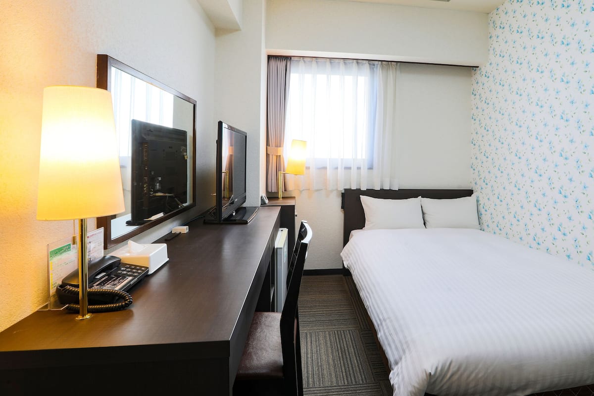 Desk, blackout curtains, iron/ironing board (on request), free WiFi
