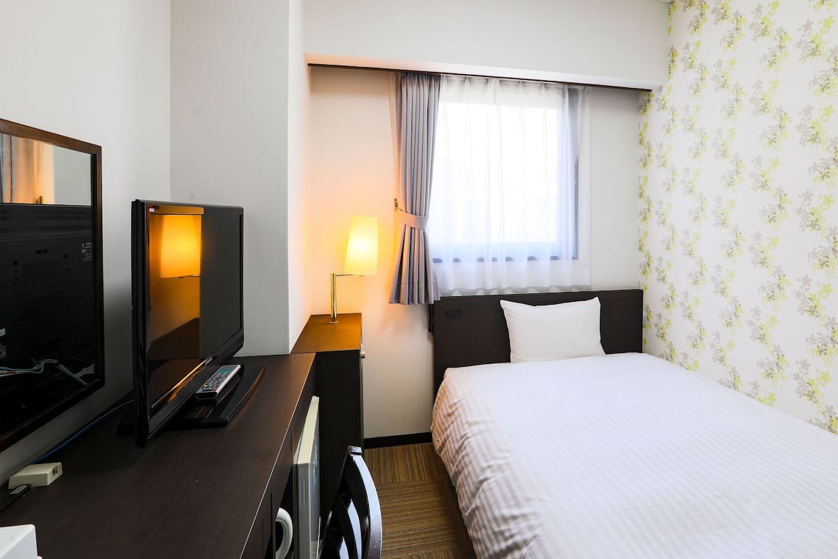 Desk, blackout curtains, iron/ironing board (on request), free WiFi