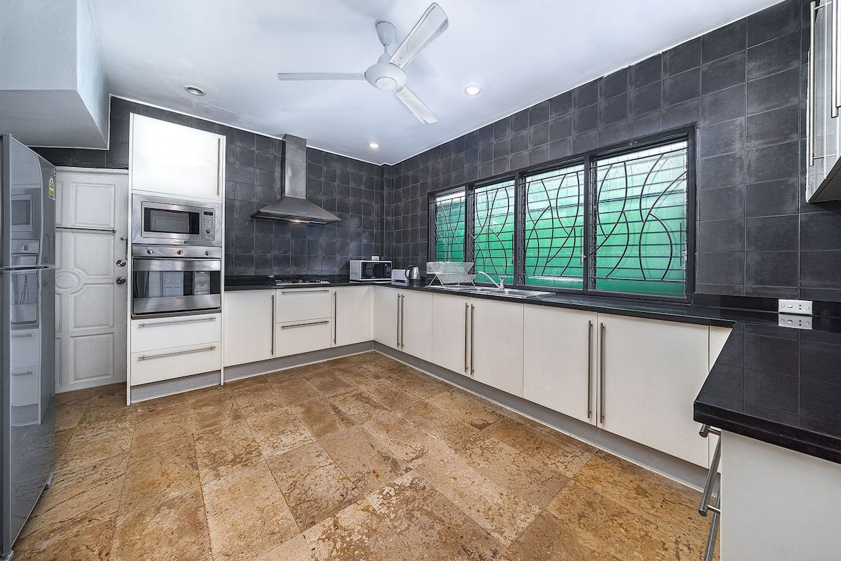 green oasis 4 bedroom pool villa | private kitchen | full-sized fridge, microwave, stovetop, coffee/tea maker