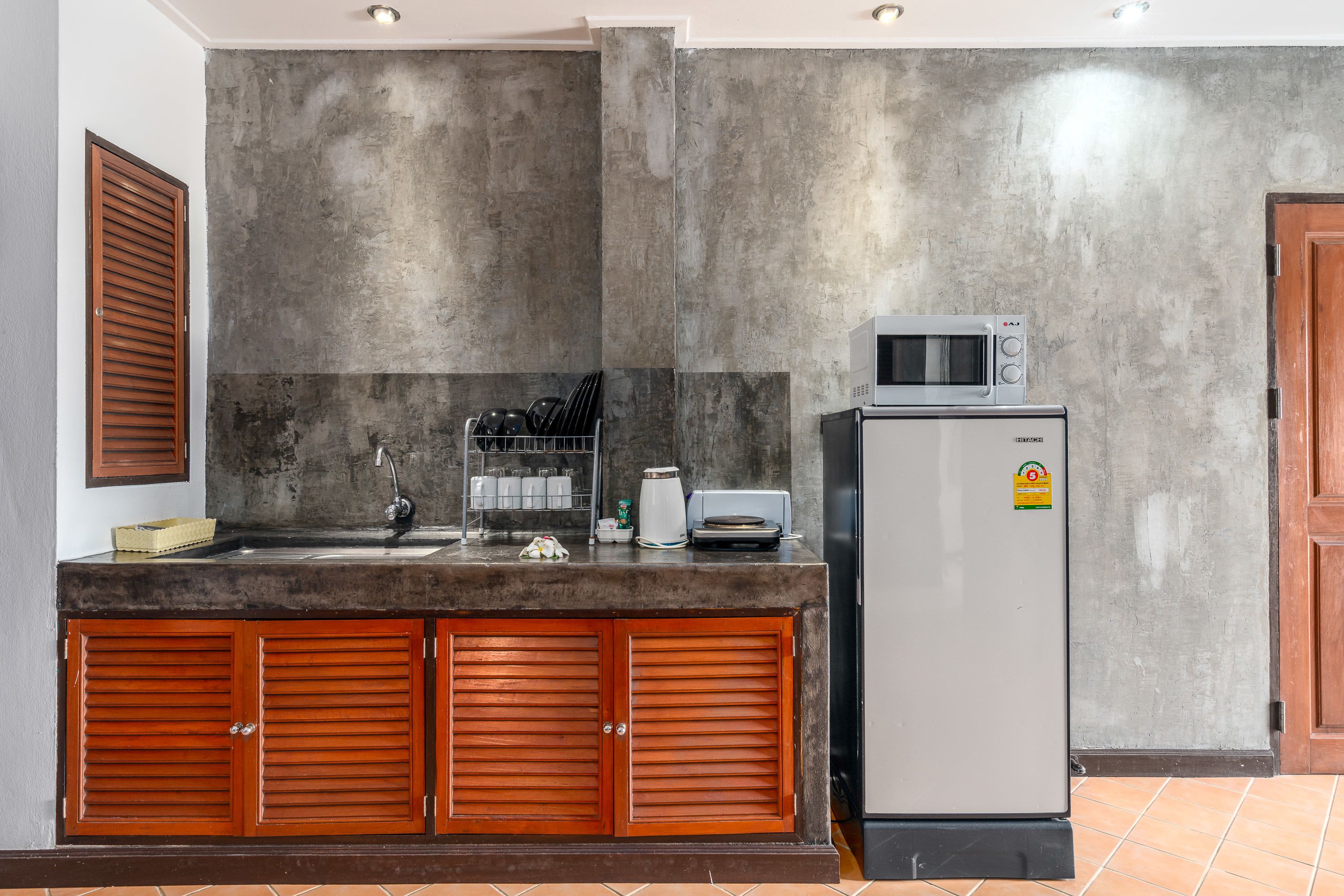 design apartment, 2 bedrooms, pool access, lake view | private kitchenette | full-sized fridge, microwave, stovetop, coffee/tea maker