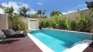 Outdoor pool, pool umbrellas, pool loungers