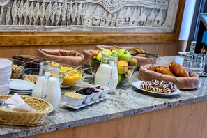 A breakfast buffet with various food items and beverages. - Lux Hotel (Banska Bystrica)