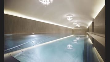 Indoor pool, open 7 AM to 10 PM, pool loungers