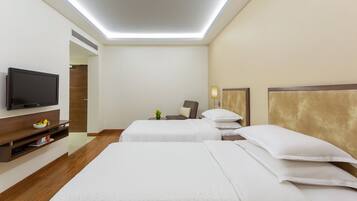 Premium bedding, down duvets, Select Comfort beds, minibar