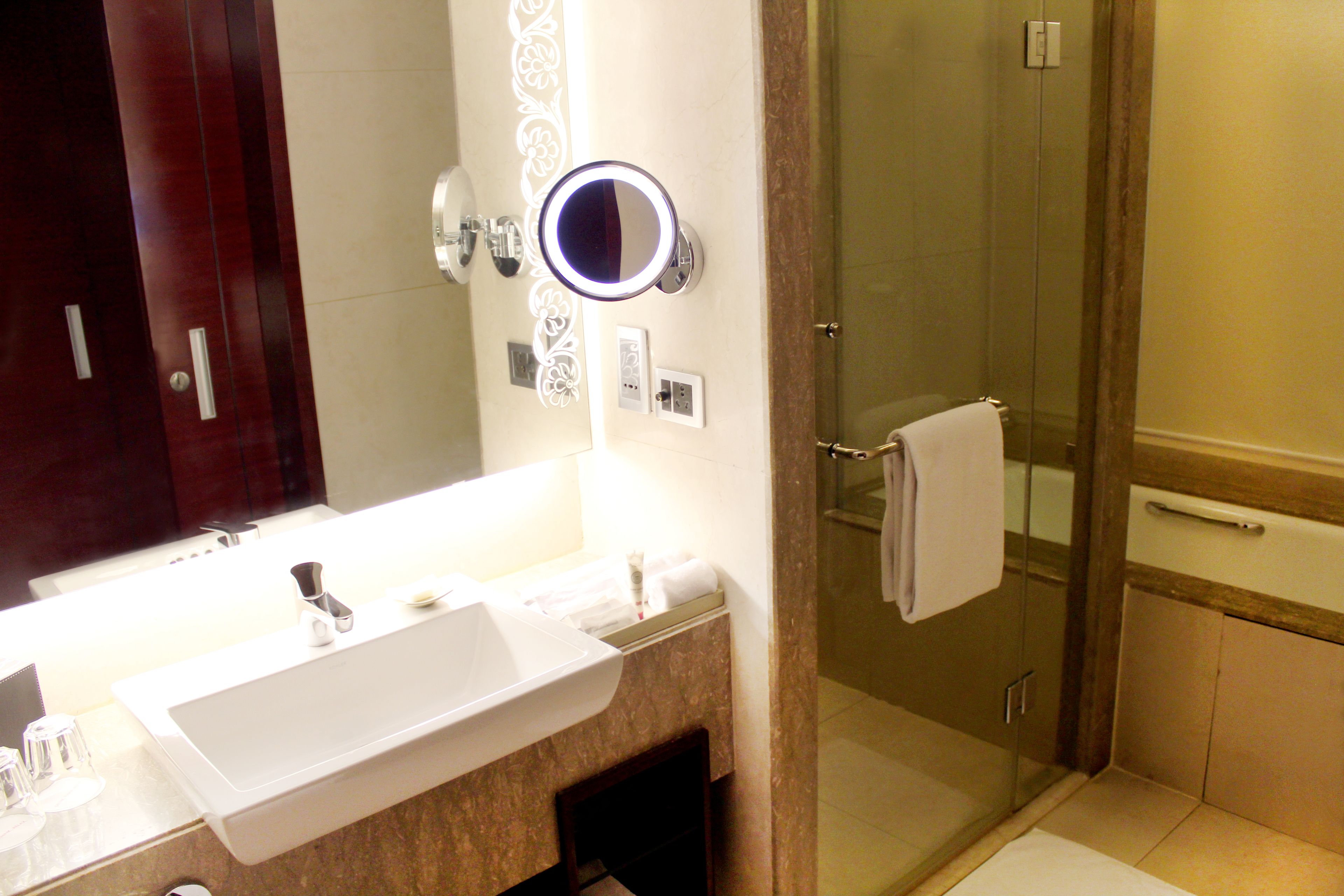 separate bathtub and shower, deep-soaking bathtub, rainfall showerhead