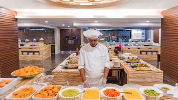 3 restaurants, breakfast, lunch, dinner served; Indian cuisine