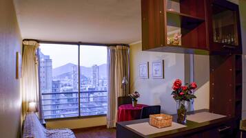 Royal Apartment, 1 Bedroom, City View | Living area | 32-inch LED TV with cable channels, TV, DVD player
