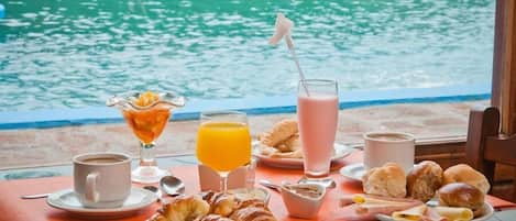 Breakfast, dinner served; Regional cuisine, pool views