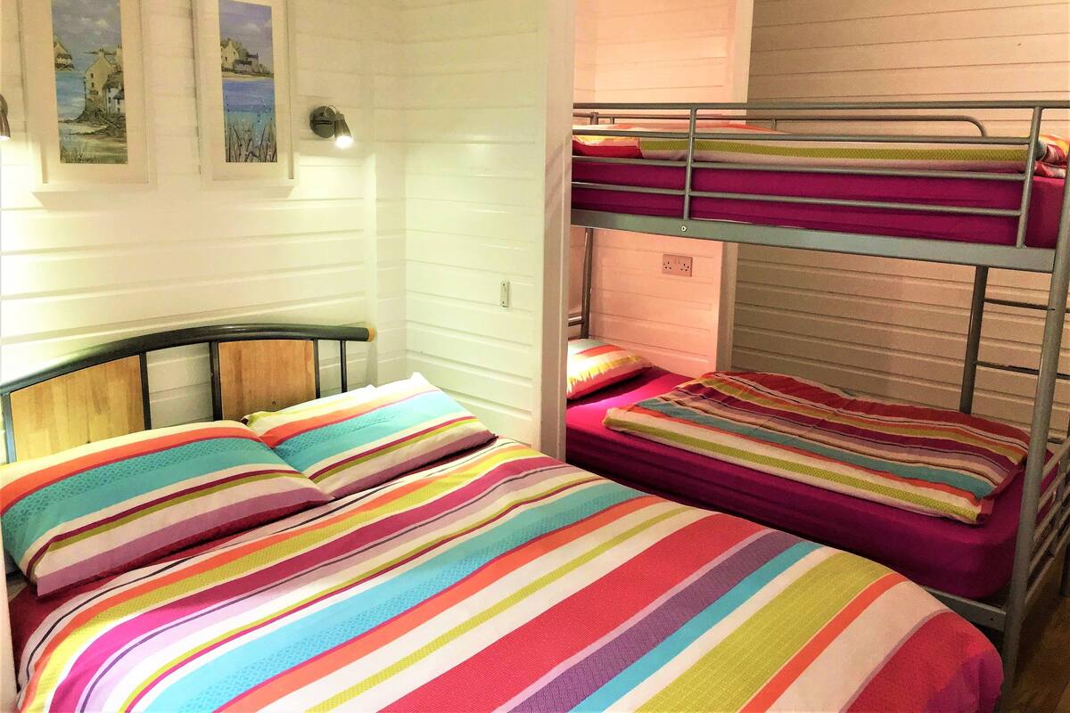 Family Room, Ensuite (The Ocean Chalet) 2 Adults & 2 Children | Iron/ironing board, free WiFi, bed sheets