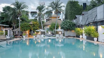 Outdoor pool, free pool cabanas, pool umbrellas