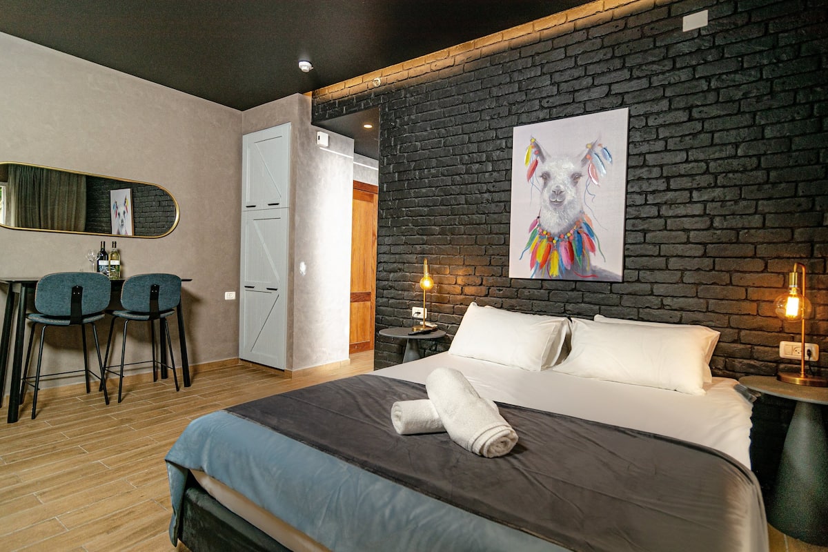 Studio Deluks, pemandangan kebun, area taman | Seprai premium, minibar, brankas, dan kedap suara