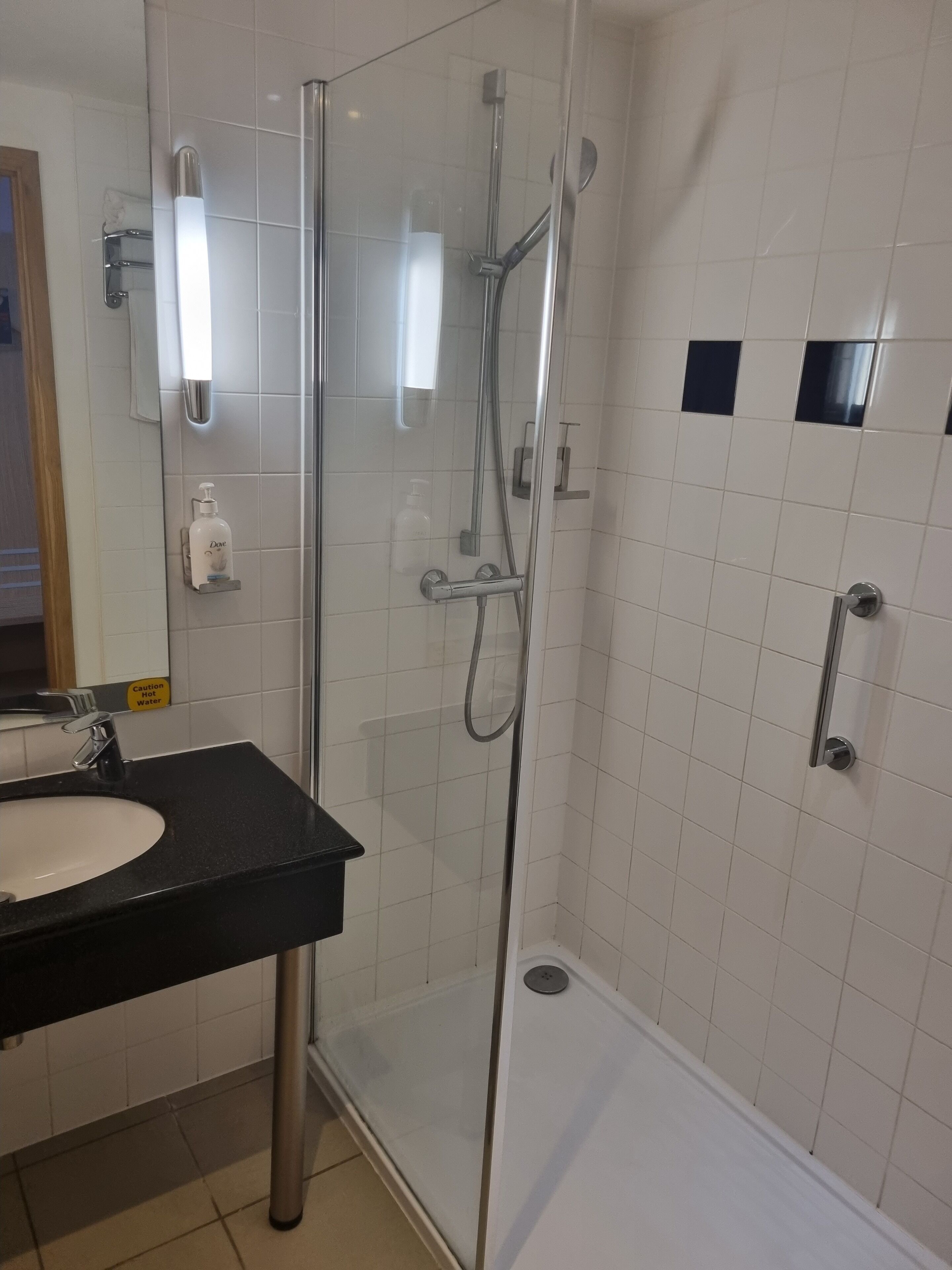 shower, free toiletries, hair dryer, towels