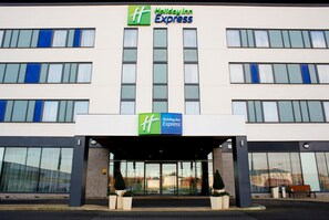 A Holiday Inn Express building with a modern facade, large windows, and a prominent entrance. - Holiday Inn Express Rotherham North by IHG (Rotherham)