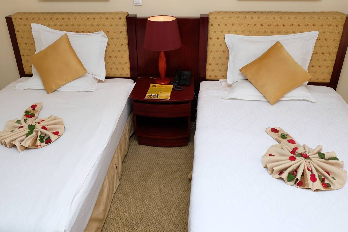 Down comforters, memory foam beds, minibar, in-room safe