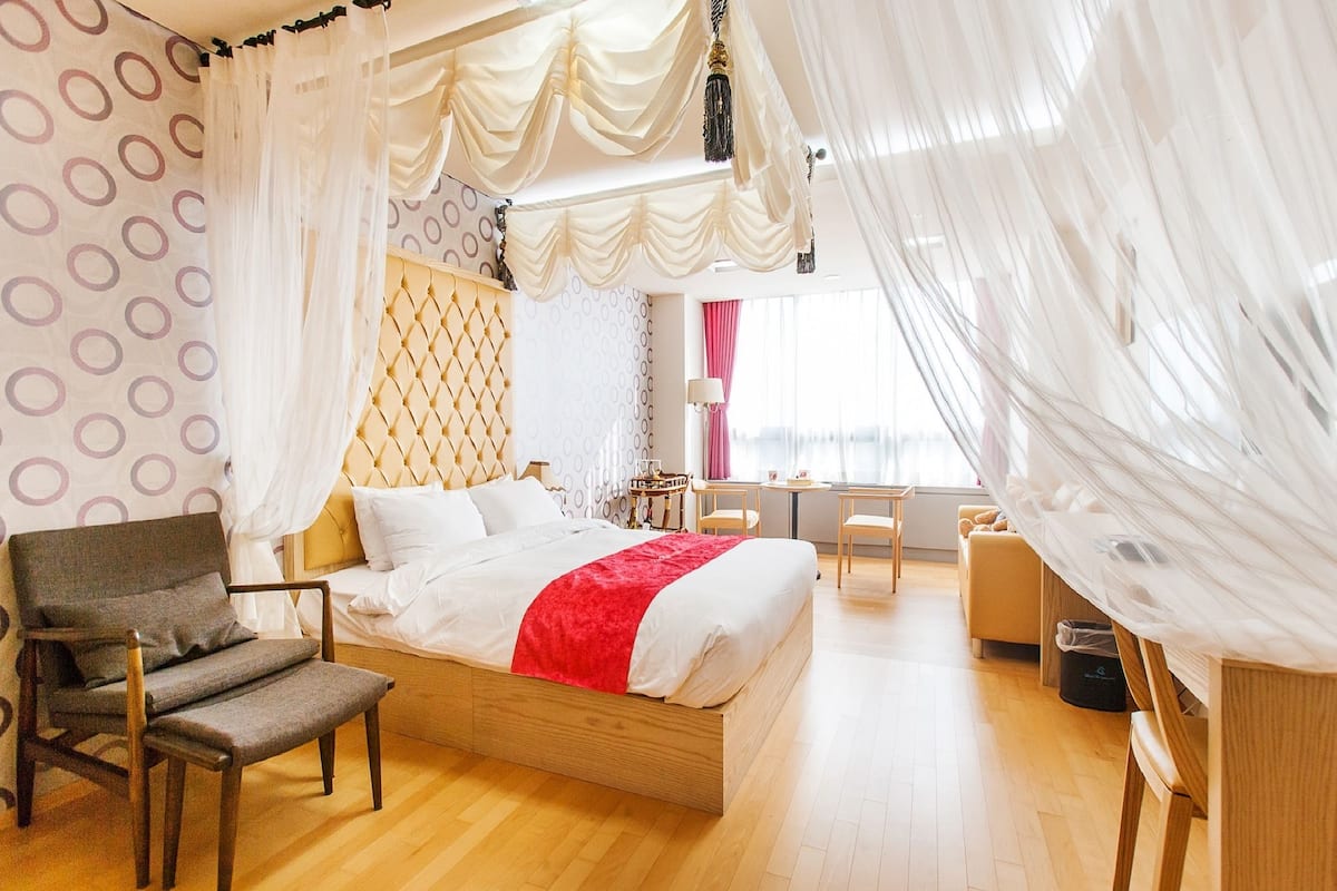 premium bedding, down duvets, pillow-top beds, individually decorated