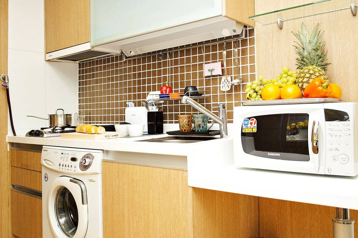 full-sized fridge, microwave, stovetop, coffee/tea maker