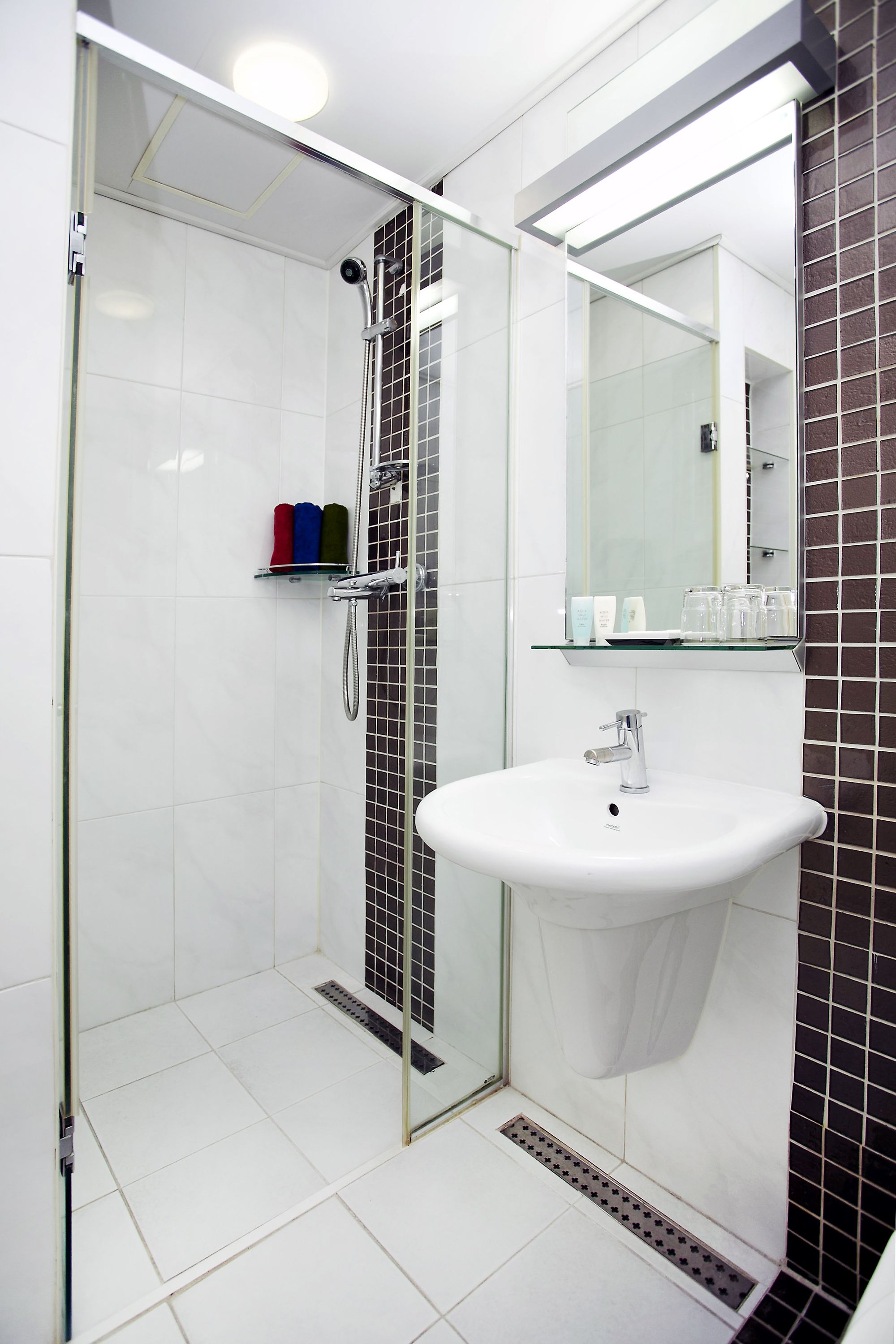 shower, designer toiletries, hair dryer, bathrobes