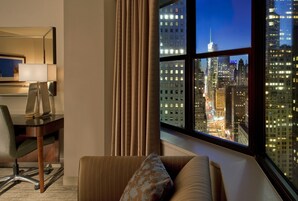 Premium bedding, down comforters, pillowtop beds, minibar