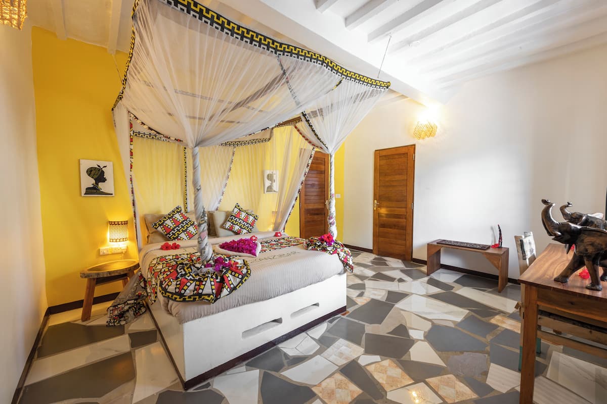 Family Room | Down duvets, memory-foam beds, in-room safe, free WiFi