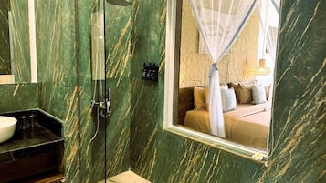 Shower, free toiletries, hair dryer, towels