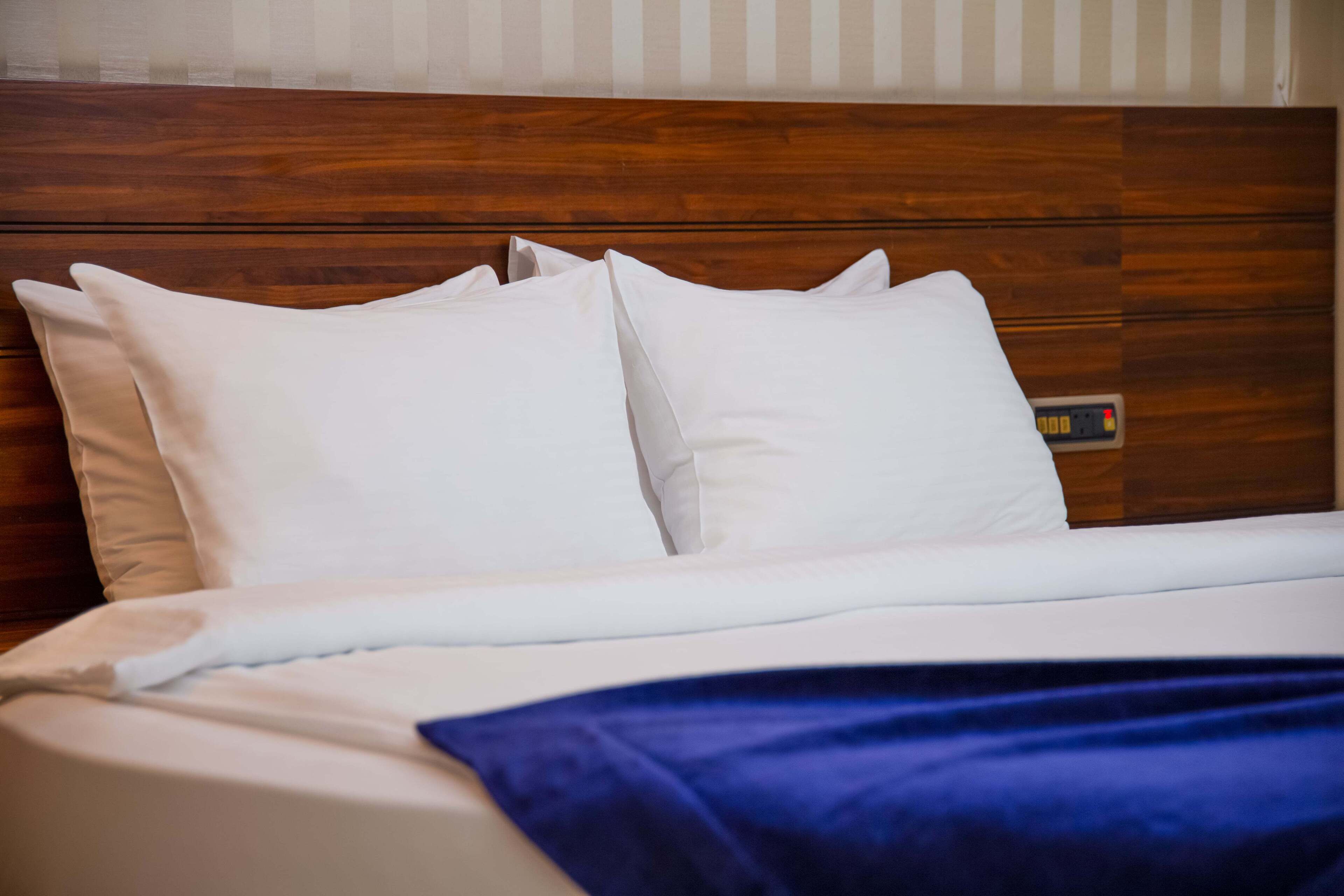 deluxe room | premium bedding, minibar, in-room safe, individually decorated