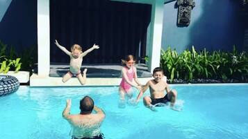 Outdoor pool, pool umbrellas, pool loungers
