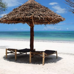 Private beach, white sand, sun loungers, beach umbrellas