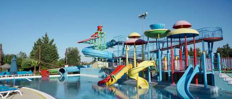 A water park with slides and play structures.