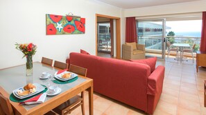 Standard Apartment, 2 Bedrooms | Living area | TV