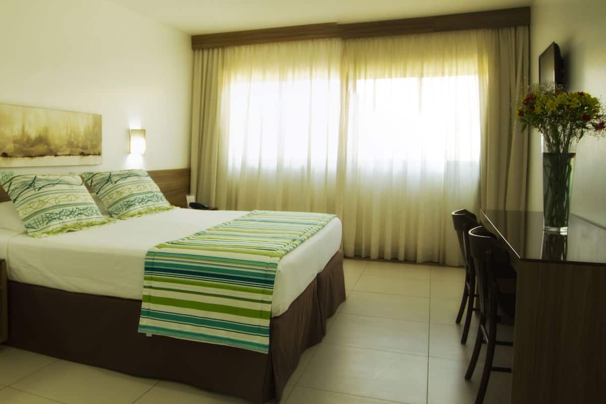 Minibar, desk, blackout curtains, free cots/infant beds