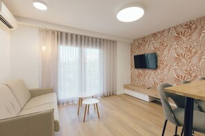 디지털 채널 시청이 가능한 32인치 평면 TV, TV