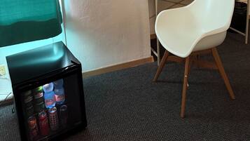 Desk, laptop workspace, blackout curtains, iron/ironing board