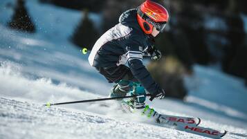 A person skiing on a snowy slope.