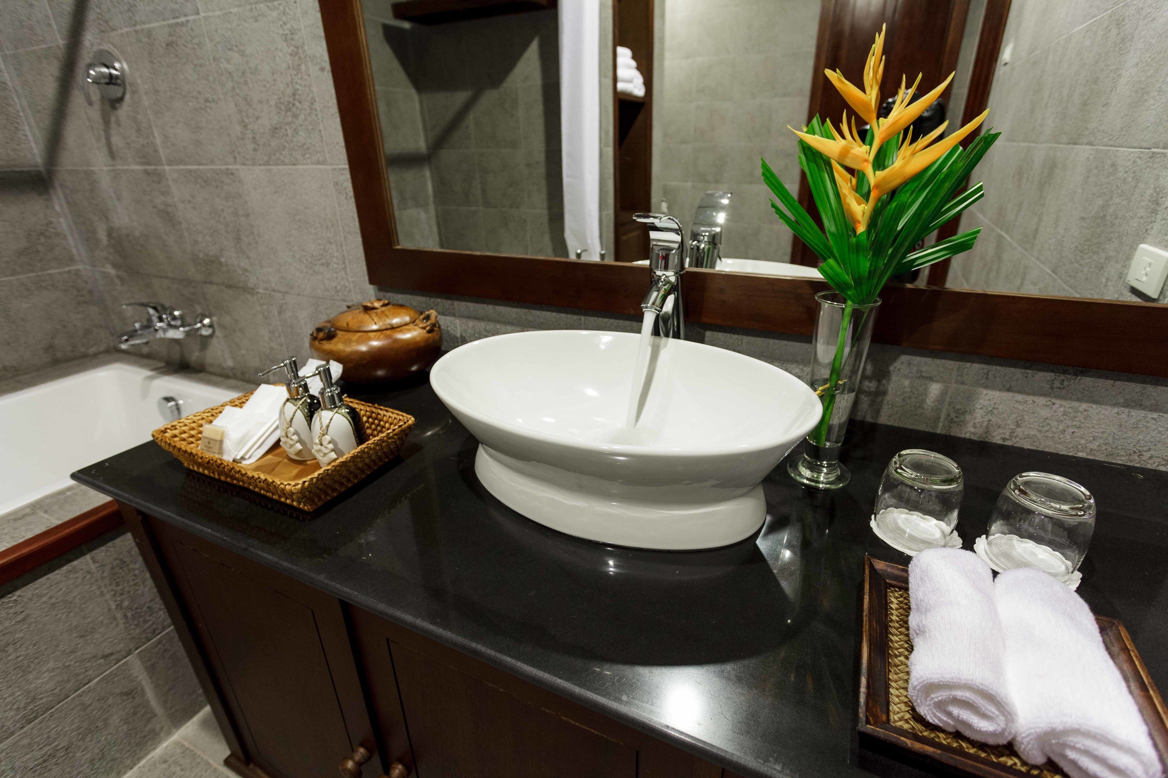 hair dryer, bathrobes, slippers, towels