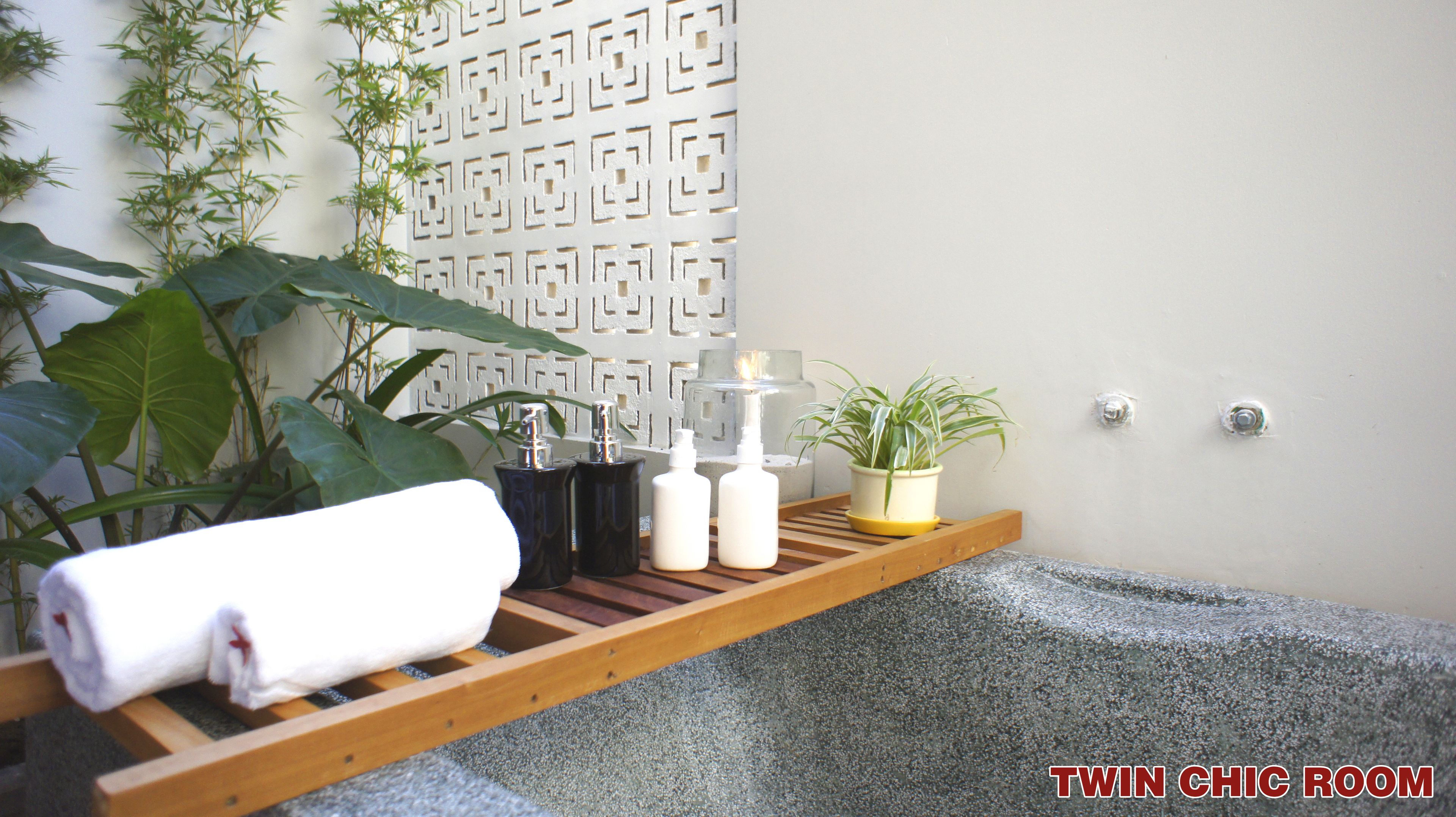 separate bathtub and shower, deep-soaking bathtub, designer toiletries