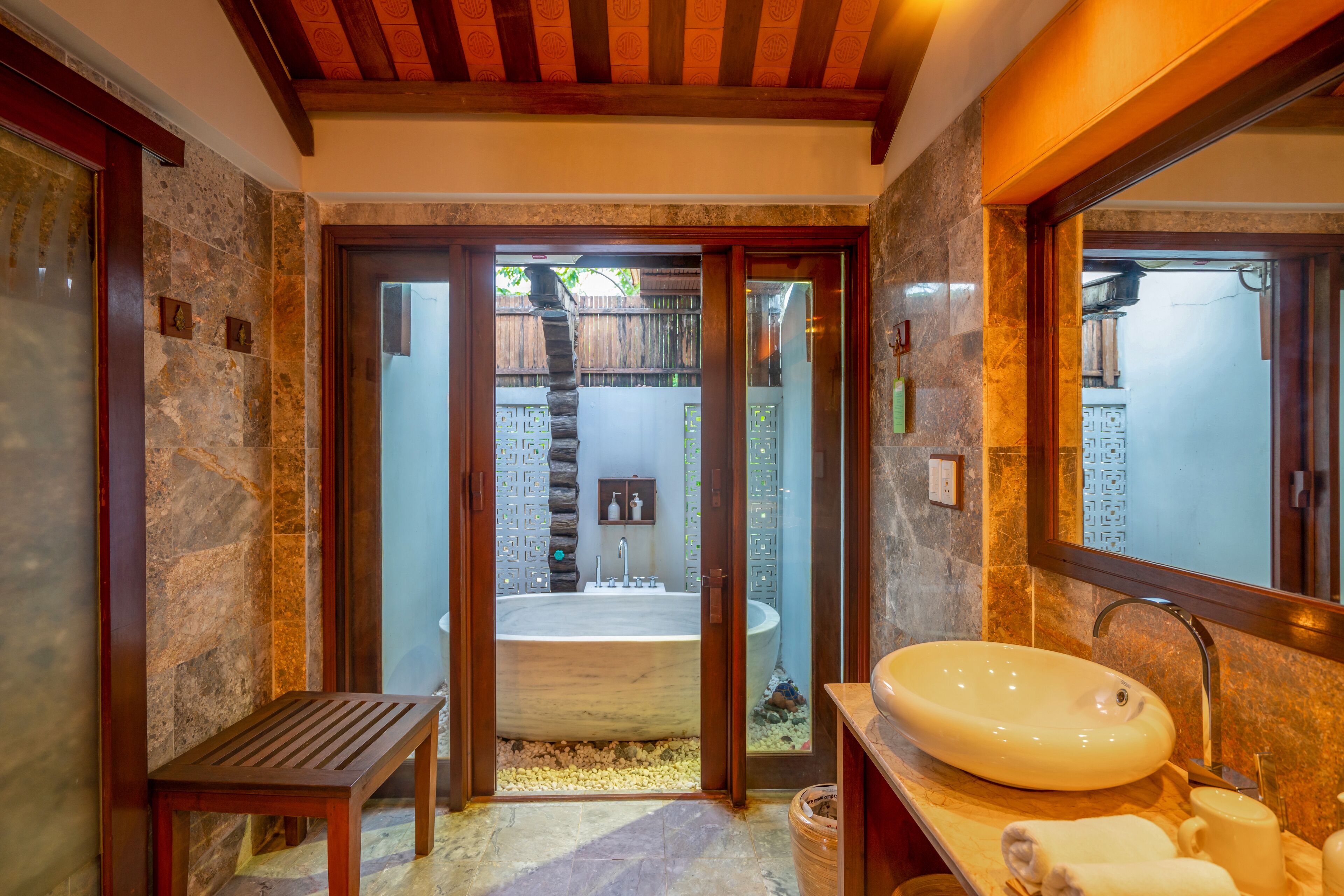 family suite | bathroom | separate bathtub and shower, deep-soaking bathtub, designer toiletries