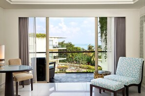 Suíte júnior, 1 quarto, vista para o oceano | 1 quarto, roupas de cama premium, cofres nos quartos, escrivaninha